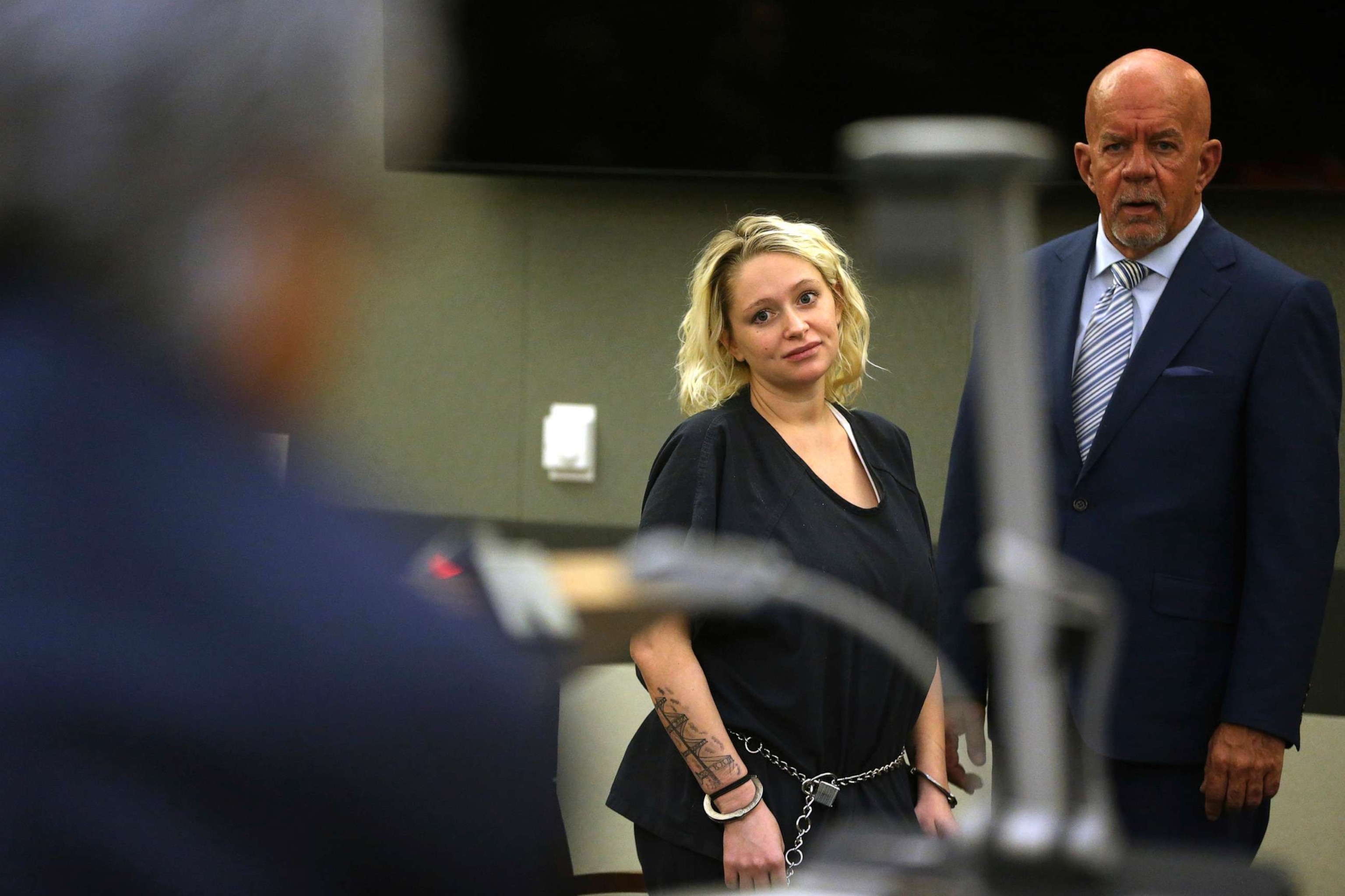 PHOTO: IN this June 13, 2019, file photo, Kelsey Turner, left, with her attorney Brian Smith, appears for her court hearing where she pleaded not guilty to a murder charge in the death of a California psychiatrist, in Las Vegas.